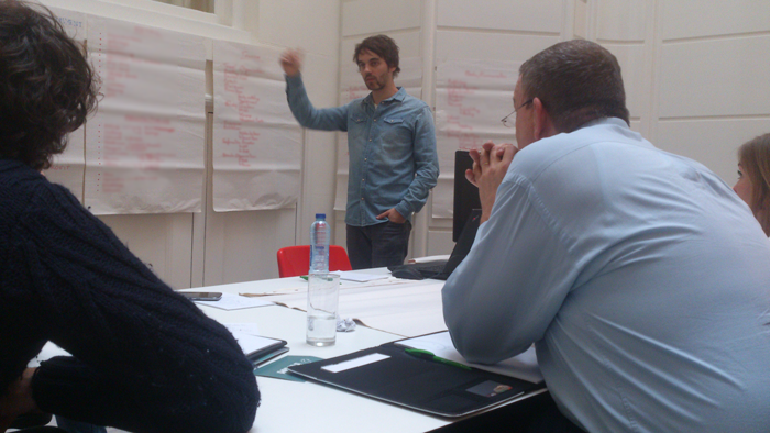 Philipp Benkler sharing insights to the Benelux-team