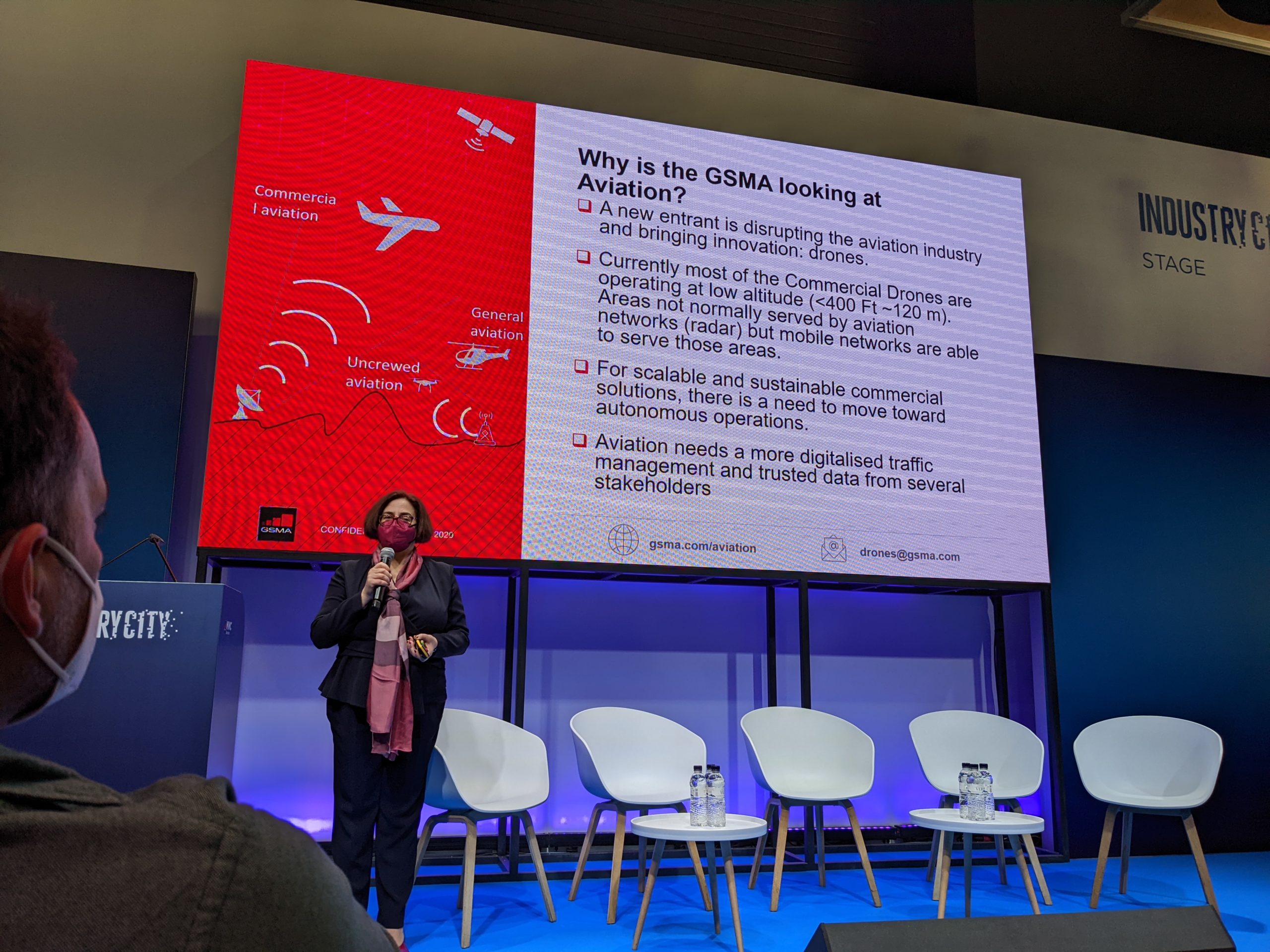 woman is showing her presentation at MWC